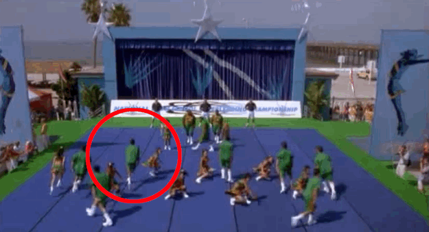 During their performance, two cheerleaders accidentally run into each other — something they definitely would have lost points for in real life.