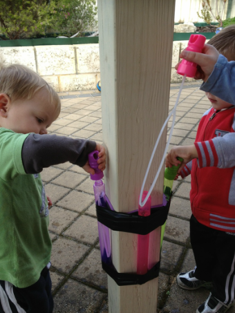 Tape your kid's bubble wand to a pole or wall for a spill-proof bubble station.