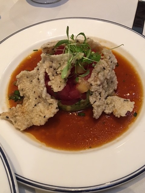 Fresh ahi tuna is gently placed on top of avocado mash and diced Asian pear over a flavorful ponzu sauce. The tuna tartare is served with crunchy chips.