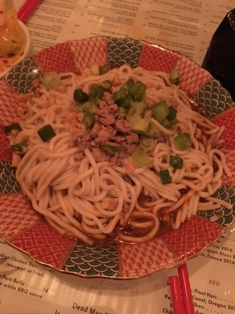 The chewy egg noodles are mixed in spicy chili oil and topped with scallions, minced pork, ground peanuts, and Sichuan pepper. If you are a fan of spicy dishes, you will certainly love the Dan Dan Mian.