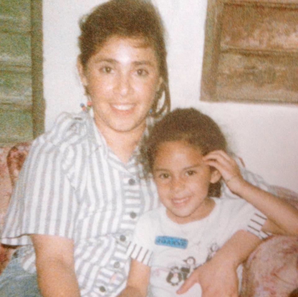 A young Campos-Palma with her mother, Thelma, in 1991.
