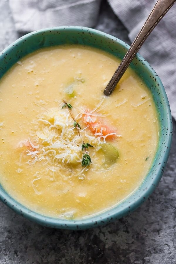 bowl of soup with grated cheese