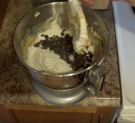 Add the flour mixture and chocolate chips, mix together until dough forms.