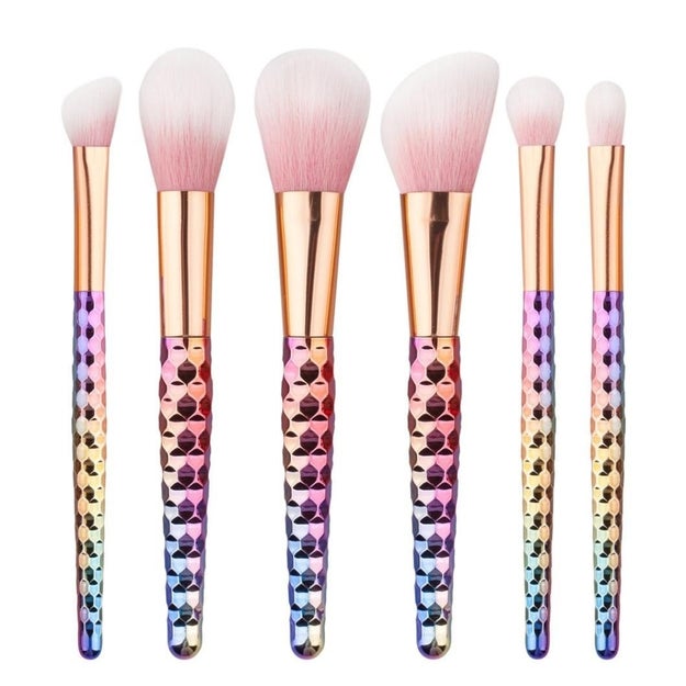 SMTSMT Makeup Brushes have a rainbow scale-like design that are a must for any mermaid's collection.