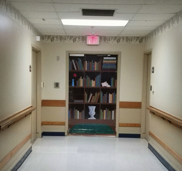 The door in this Alzheimer's ward designed like a bookcase to try and stop patients from walking out.