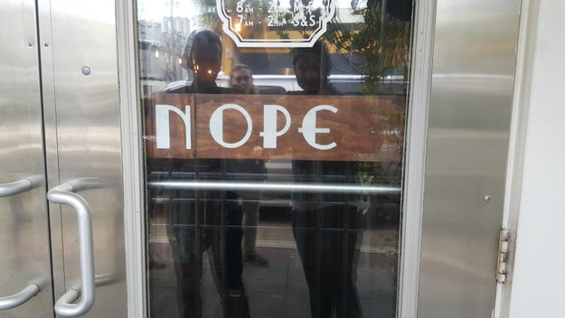 This café that just moves the "N" when it's open.