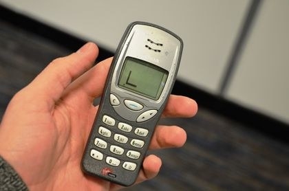person making a snake pattern on phone