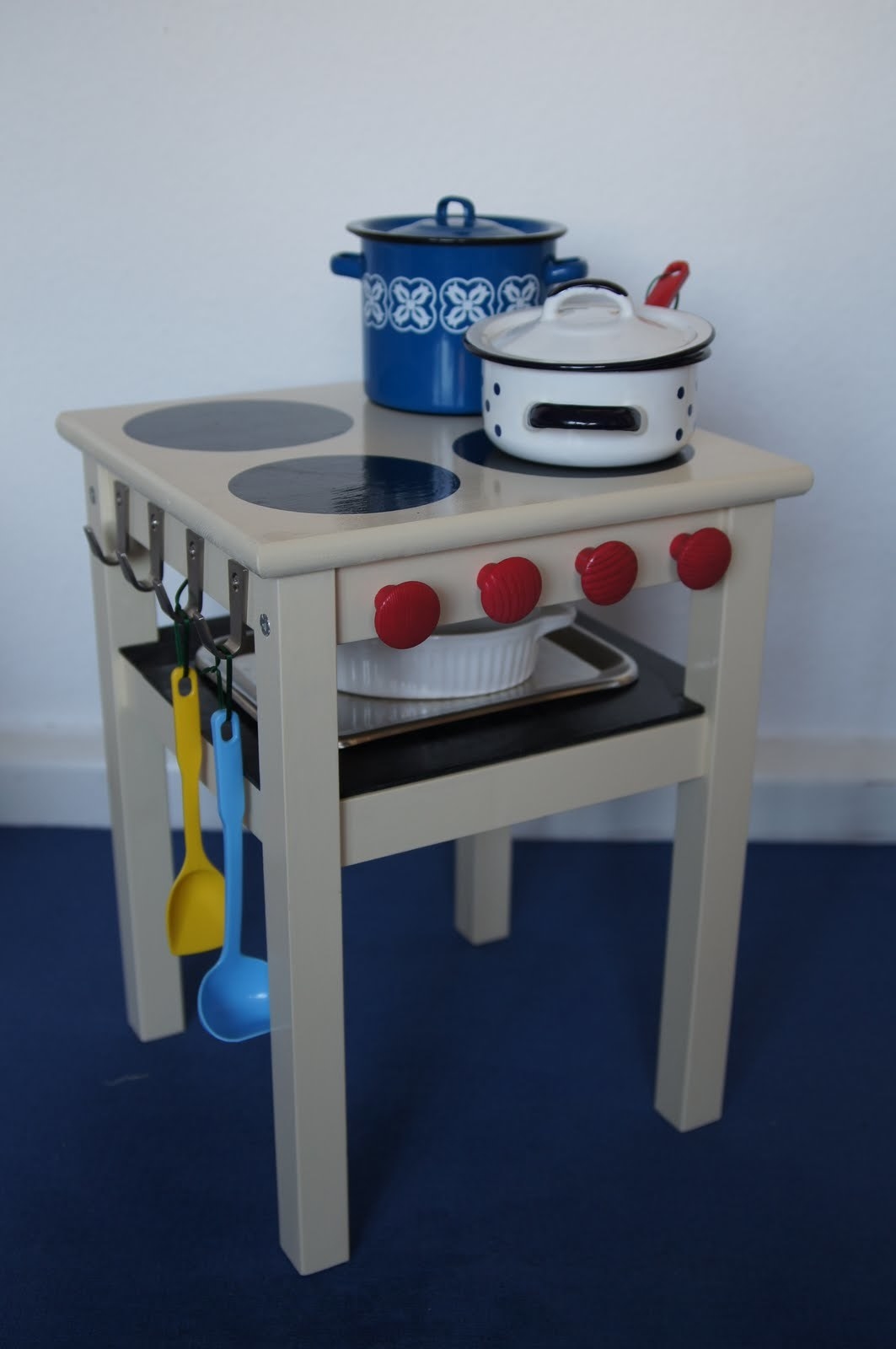 Honestly, I never would have thought this was doable if I didn’t watch our friends whip up a killer version of one of these for their daughter. I might even break my stay away from Ikea for the rest of my life rule to make this quick and easy little table stove. I bet you could also turn this little table into an activity table. You could also give it top coat of chalkboard paint to make a drawing station.See a huge list of tutorials and ideas here: http://www.itsalwaysautumn.com/2015/10/23/20-coolest-diy-play-kitchens.html