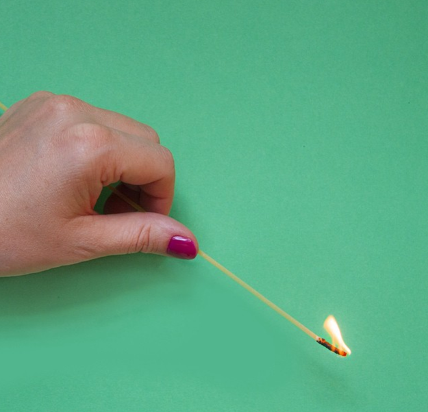 Use an uncooked spaghetti noodle to light candles with short wicks.