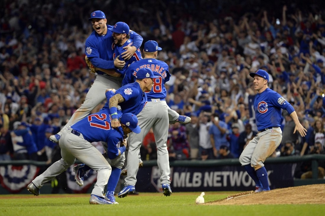 CLEVELAND, OH - NOVEMBER 2: Members of the Chicago Cubs celebrate defeating the Cleveland Indians in Game 7 of the 2016 World Series at Progressive Field on Wednesday, November 2, 2016 in Cleveland, Ohio. (Photo by Ron Vesely/MLB Photos via Getty Images)