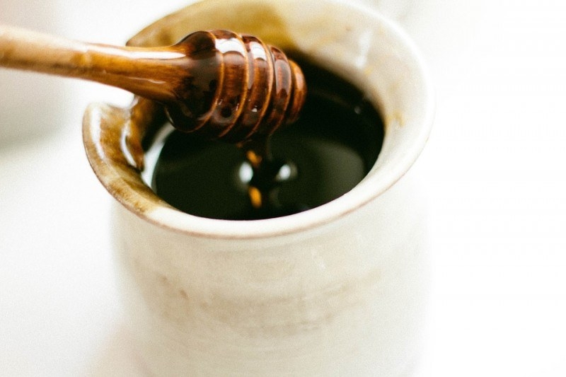 Date honey, date syrup, or rub (Arabic: رُب, pronounced rubb), in Hebrew, pronounced 'silan,' is a thick, dark brown, very sweet fruit syrup extracted from dates. It is widely used in North African and Middle Eastern cooking. It is used in Israel as a dip for bread, in pastries, as a topping and more and has been a staple of Judean cuisine since biblical times. In fact, ancient Judean coins from Roman times have a date palm on them, as dates -- because of date honey -- were a major cash crop for Jewish peasants and lords back then.