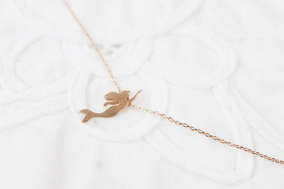 This necklace because look at it, isn't it neat? Wouldn't your collection be complete?
