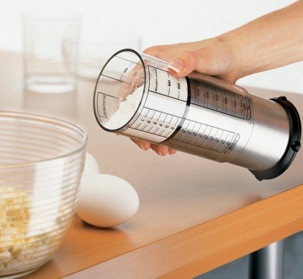 An adjustable measuring cup that cleanly plunges out the exact amount.