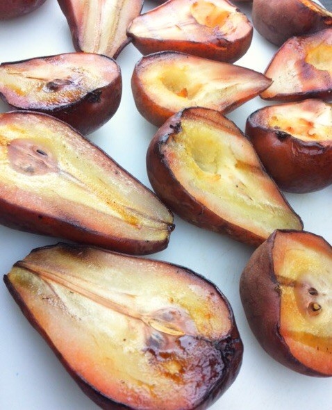 Yes, absolutely- fresh pears are available everywhere! But, smoked pears can be an unique culinary treasure deserving of rave reviews! Here’s the scoop: Depending on where you’re located, you’ll have at least a few varieties of pears to select from. Rather than just enjoy these as a raw fruit, why not try something truly unique that will give them a kiss of wood flavoring?Stove top smoking is so easy and a great way to still enjoy wood-fired flavorings during the winter months, when you may not want to venture out to the grill or smoker. I’ll be highlighting Bosc pears in today’s technique. To do this technique you will need:• A stove top smoking pan set up – I’m using the Technique® Cast Iron Smoker Pan• SmokinLicious® Minuto® Wood Chips Size #4 in your choice of wood species• Fresh pears – 4 will likely fill the smoker pan one time• A Chef’s knife, paring knife, and cutting board• A cooling rackPREPARING THE PEARSWhen I purchased my Bosc pears, I made sure that they were firm to the touch so that I would have some longevity to their use in recipes for a while. Carefully, wash each pear and then pat dry with a paper towel. I then slice each pear in half, removing the stem tip. This will give me a flat surface to smoke and cook my pears since I am using a stove top grill pan with my process. That will allow me to form some great grill marks on the pears while they cook. The benefit to using halves of pear is I can feature larger pear cuts in a salad or dessert, highlighting the golden smoked color.Once the pears are halved and the stems removed, I will core out the seeds and hard seed membrane with a small paring knife. Once that step is complete, I start the heat under my stove top smoking pan. SETTING UP FOR SMOKINGThe base smoker pan will hold the Ash Minuto® wood chips. Remember, the chips need exposure to the heat to release their flavoring. I set my burner to medium heat (a #4 setting on my stove) which is where it will stay during the entire cook. I let the pan heat for just about 5 minutes then I will be ready to add the SmokinLicious® Minuto® Wood Chips for the wood flavoring.After heating up my base pan for the chips, I add one large handful of Minuto® Wood Chips in Size #4 from SmokinLicious®. I place a drip pan over the chips to prevent any of the pear juices from dripping directly onto the chips. Then on goes my grill pan. If you’re using a standard pot for this process, you will place foil over the chips and then place your grate or steamer insert for the pears to sit on. As my pan is large, I can seat 8 halves meat side down to the chips. Keep in mind, pears are one of the healthiest fruits having a low caloric count, 22% fiber, and high antioxidant and anti-inflammatory benefits. The skin has a particularly high phytonutrient benefit making my preference for leaving it intact valid. SMOKING PROCESSImmediately, you will see just how much smoke is produced with just a handful of Minuto® Chips. Notice that the skin of the pears is taking on a very coppery finish. Although you don’t need to turn the pears during the cooking process, I have turned mine just to show the great grill marks that are developed from a 70 minute cooking time. Remember, if you have pears that are not very firm, they will require less cook time. I know mine are ready to be removed from the pan when I feel a slight give in the pear meat when I touch them with a set of tongs. Now remove to a cooling rack and start thinking about the ways to use these.THE PERFECT FINISHI bet these caramelized, glistening beauties are just making your mouth water! Once I cool these on a rack you’ll see how easy the skin can be removed if you should want to use just the pear meat. There are so many ways you can highlight the smoky flavor: in a smoothie, in a cocktail – think smoked pear bellini, which I will have an upcoming recipe, sliced in a salad with gorgonzola cheese and a drizzle of balsamic, anything your mind can dream up. Not only will you have a tantalizing flavor boost but you’ll reap the benefits of this very healthy fruit that even kids will love. So, let’s hear it- three cheers for pears and how about three more for the tasty, smoked version! Bon-Bar-B-Q!