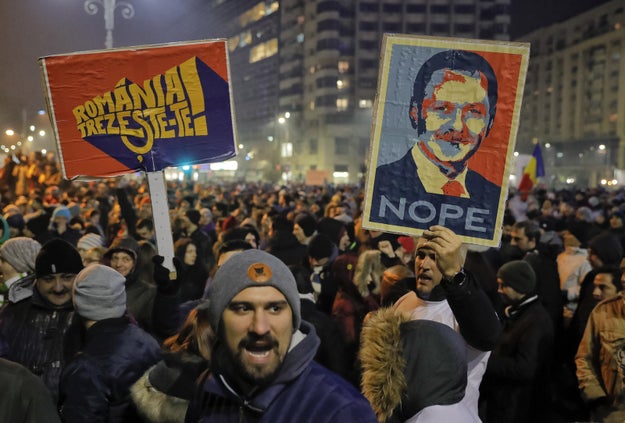 Hundreds of thousands of Romanians have taken to the streets of Bucharest, the country's capital, after the government passed an emergency decree that would free officials charged with corruption.