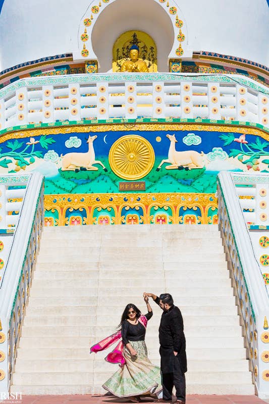 This is them having a twirl at the Shanti Stupa.