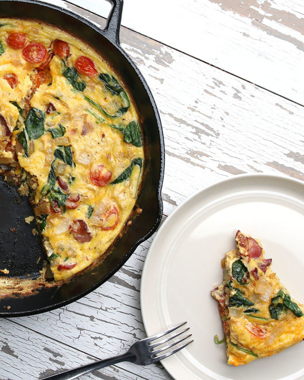 frittata with a piece cut out and on a plate