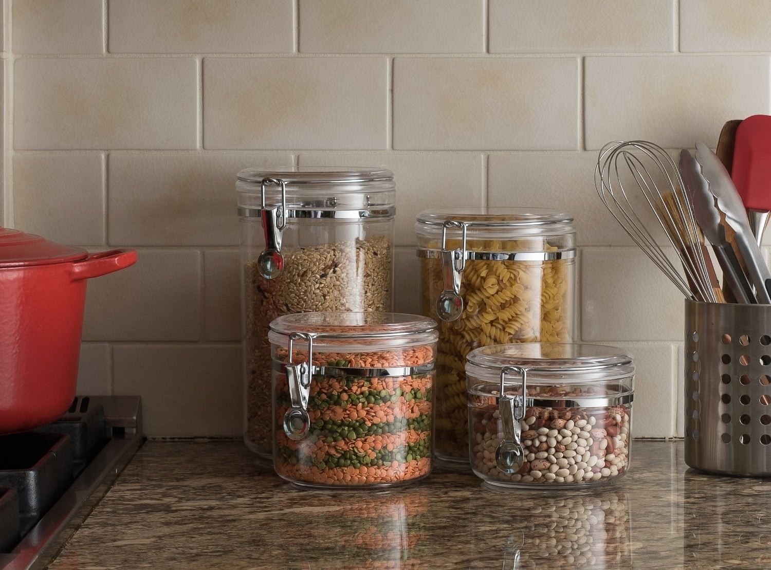 clear food storage jars on a kitchen counter