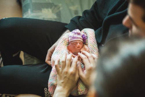 'To give more context, when we took the picture (above) where you can see her tumor, it had already been drained and reduced in size,' Paradiso said.