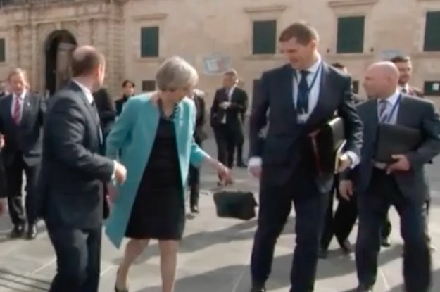 Theresa May Made The Man In Charge Of Brexit Carry Her Handbag