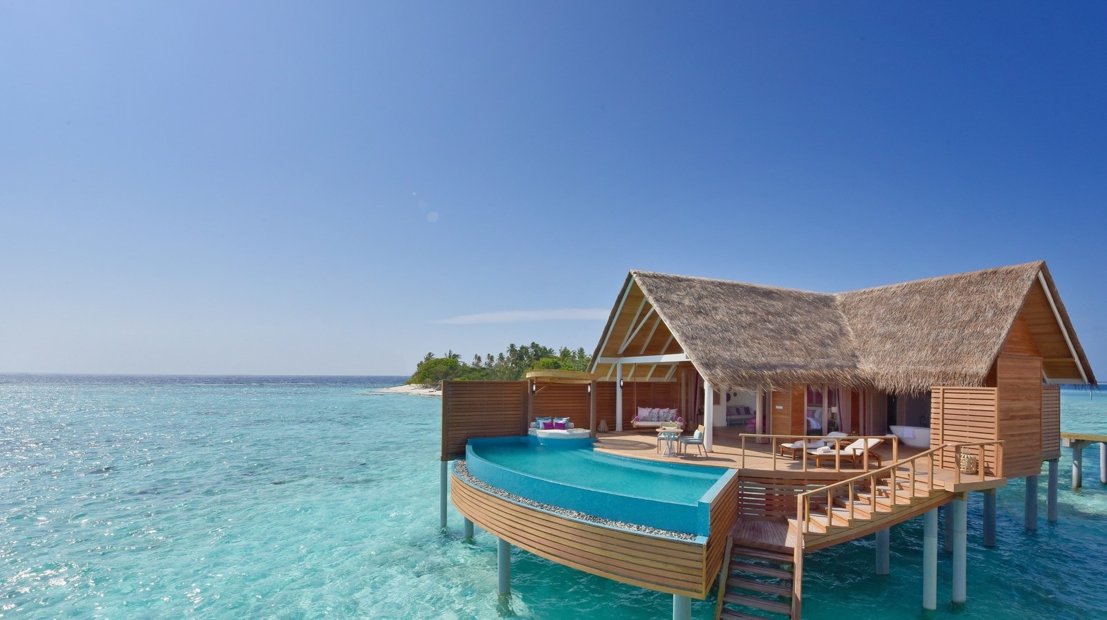 An island villa surrounded by sea with it's own pool, outdoor bed and free snorkling sessions throughout stay.Price: £1,170 per night.