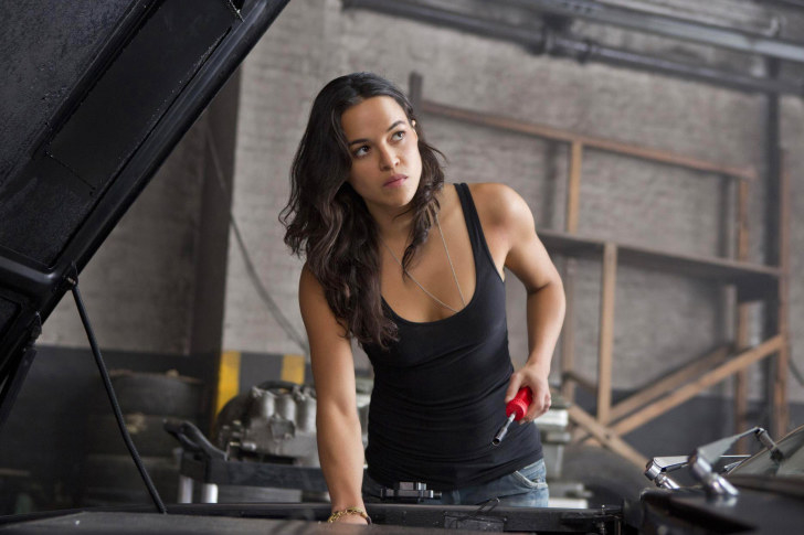 Although I do have some concerns about the franchise, especially in how it's geared towards male audiences and even its portrayal of women can come across as imaginary at best, Letty Ortiz is still a badass. It's frustrating because she is a great character, but she can come off as inauthentic and the perfect fantasy girl. Regardless, we'll focus on what makes her great. She is the only woman in Dominic Toretto's crew and she is shown to be just as competent of a drag racer as any of the men in the crew and even Dominic himself. She is a skilled fighter and packs a mean punch too. She doesn't shy away from sexual implications and is an equal to Dominic. While her character may seem like it is pandering to the male audience, you can't help but admire how well this girl drives and you wouldn't mind learning a thing or too from here.