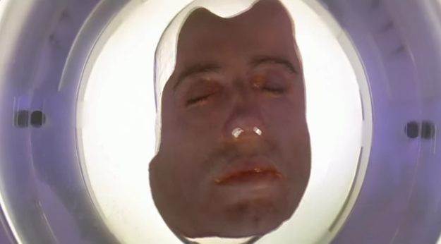 ...and John Travolta's face floating in a Petri dish.