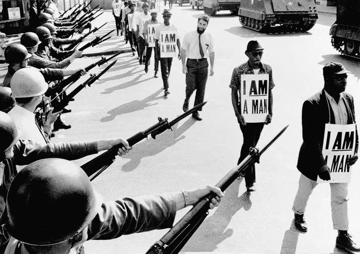Civil rights activists trying to stage a protest are blocked by National Guardsmen brandishing bayonets on Beale Street in Memphis, Tennessee, 1968.