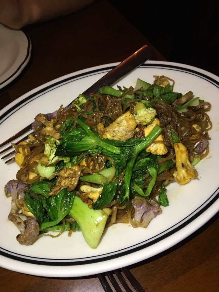 Unlike the traditional Pad See Ew that features wide noodles, the PCU Noodle at Pinto Garden is made with thin rice noodles. The noodles are sauteed in dark soy sauce with fresh farm scrambled egg, bok choy, and colorful cauliflowers.