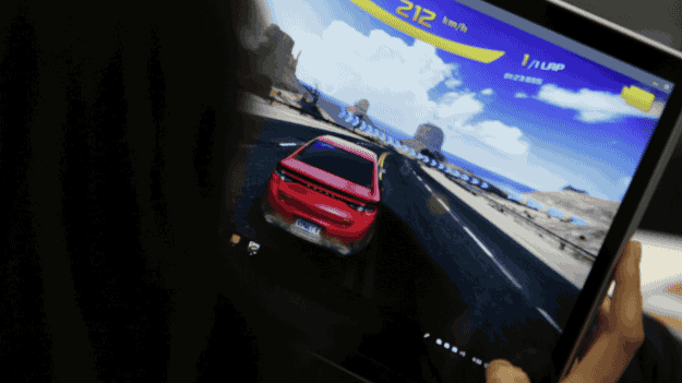 Gaming on the Chromebook Pro was...interesting. I tried a racing game called Asphalt 8 that requires tilting for steering and tapping your thumbs for braking or accelerating. The screen displayed the graphics beautifully, but the gaming experience felt awkward. The display folds back in tablet mode and can’t be detached from the keyboard, so I was constantly pressing keys accidentally while trying to keep my grip on the screen. My palm would occasionally touch the bottom dock, and I switched apps multiple times during gameplay. After about a minute in, the game started skipping frames. It was a load too heavy for the computer's processor. For more casual games, with the laptop in tablet mode, I had the device resting on my knees and found the keyboard bottom a bit unstable.