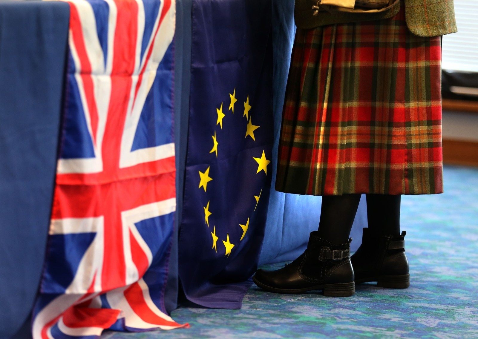 A woman wearing a kilt attends the annual Scottish Conservative conference at Murrayfield Stadium, Edinburgh.