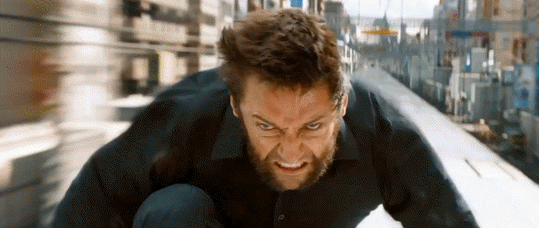 Hugh uses his body as a human shield against the blast of a nuclear bomb, and later, propels himself forward like a human bullet while on top of a train in Japan. ARE YOU NOT ENTERTAINED?!?