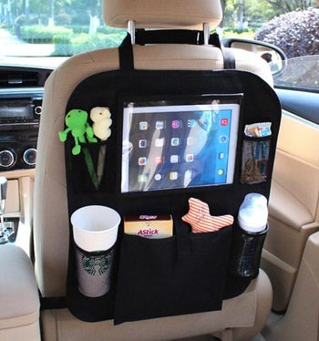 Closeup of the organizer holding a coffee cup, iPad, toys, etc.