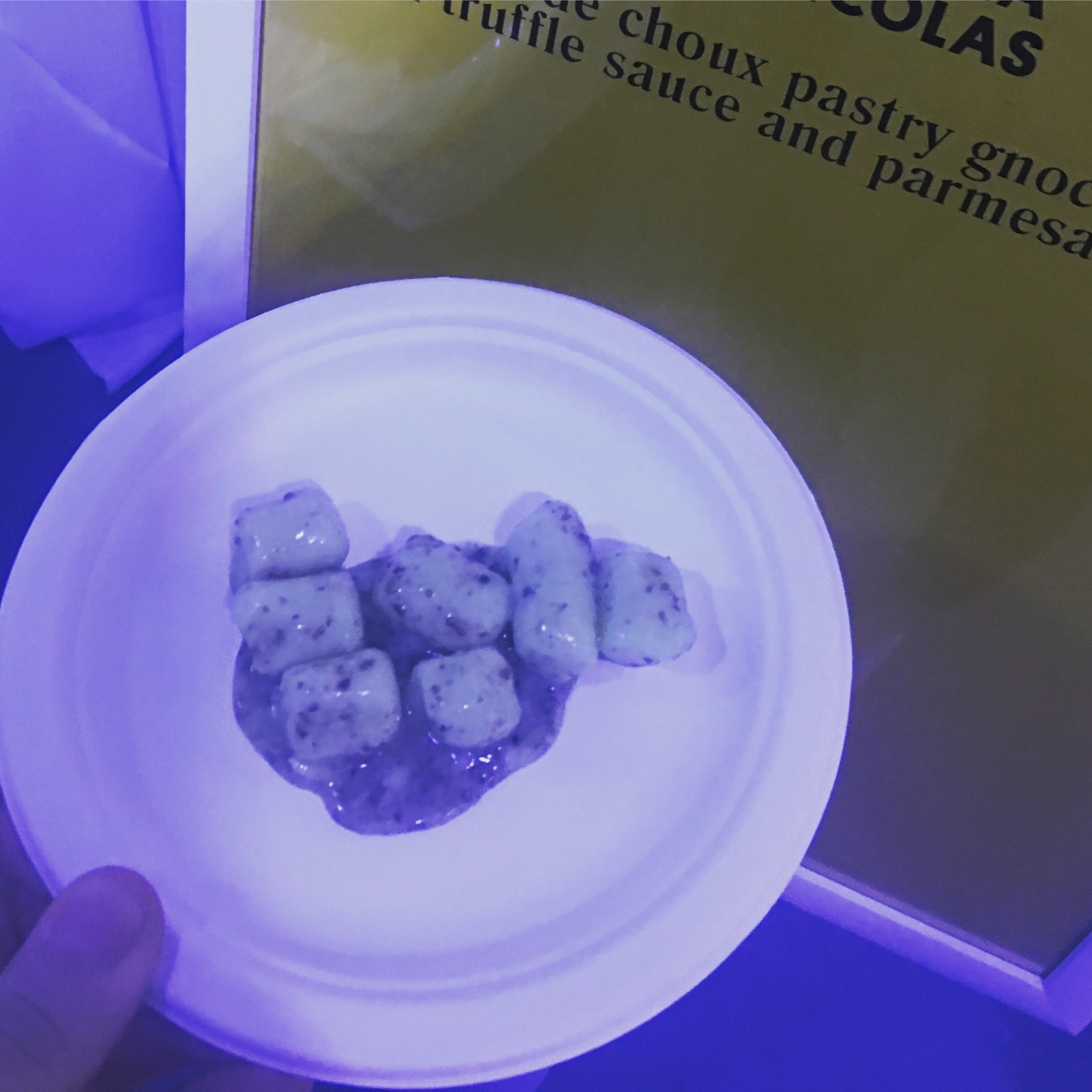 Homemade choux pastry gnocchi is served in rich truffle sauce and parmesan.