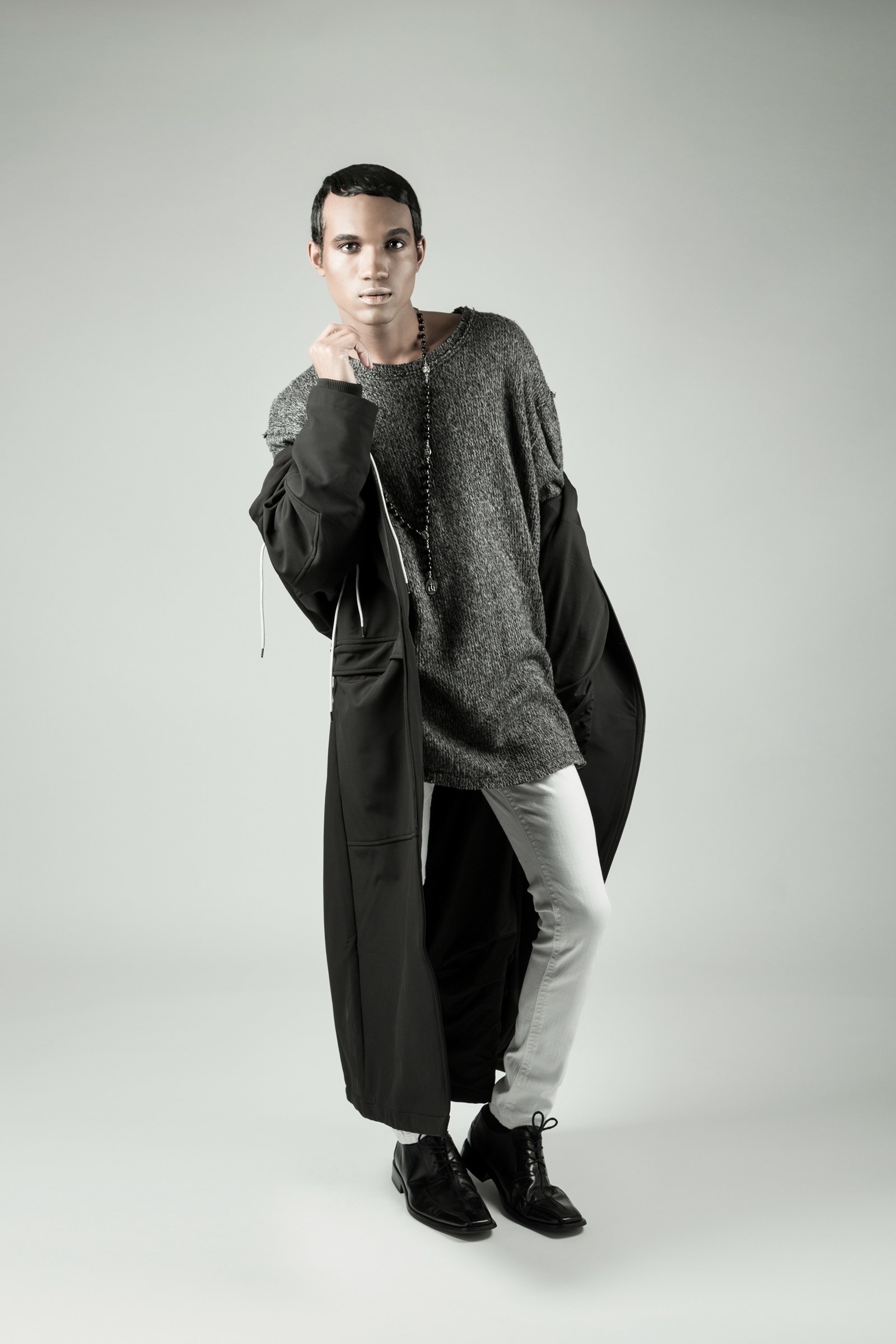 The fourth look is very NYC chic. Neutral colors and layered fabrics creates this careless and luxurious look. The long coat being the statement piece. Touching base on classism and frivolities of the elite 2%.