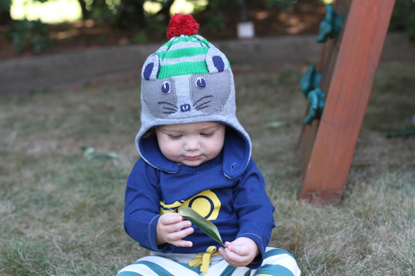A great rule of thumb for savvy mommies is to dress your baby in one more layer than you are wearing. So for example, if you're heading out wearing a shirt paired with a sweater and pants then put your little one in the same outfit but with a long sleeved body suit underneath. Wrapping up your little bundle in lots of light layers like this is a great idea because it makes it so much easier to add or remove layers to help regulate their temperature and prevent them from overheating.