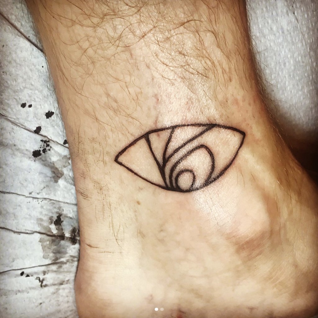 Neil Patrick Harris Just Tattooed Count Olafs Eye Tattoo To His Ankle  Count  olaf tattoo Eye tattoo Tattoos