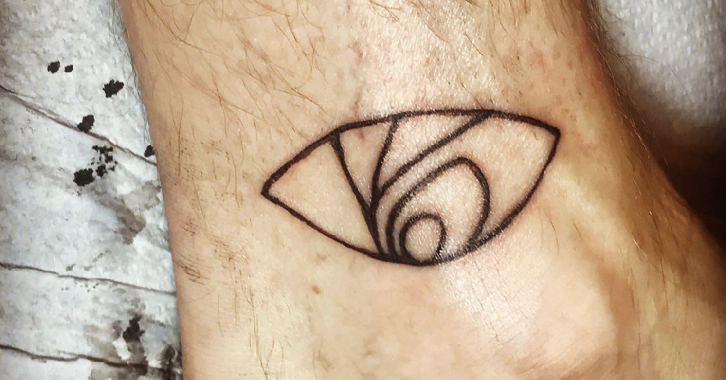 Neil Patrick Harris Just Tattooed Count Olafs Eye Tattoo To His Ankle 8753