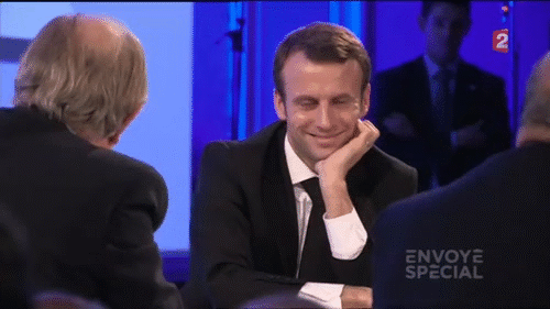 Macron is pretty happy right now because he's doing well in the polls.