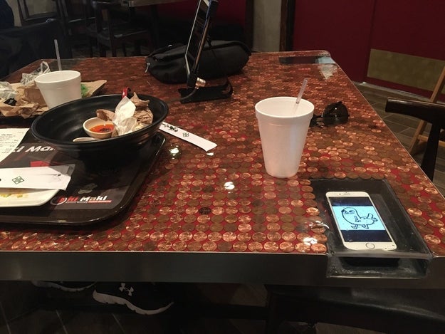 The restaurant tables that have a space for your phone so you won't spill anything on it.