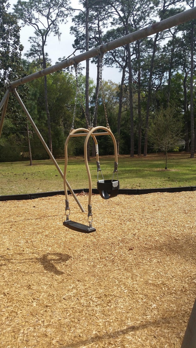 This swing that can accommodate a parent and their baby at the same time.