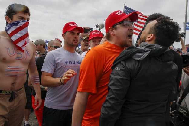 The Times reported a crowd chased a masked protester with pepper spray before he was detained by officers with the California Highway Patrol.