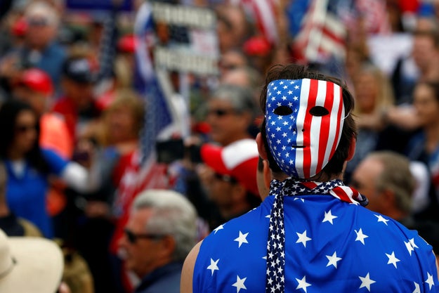 Hundreds of flag-waving Trump supporters attended the Saturday rally, as well as dozens of counter-protesters.