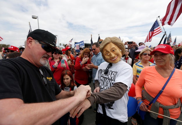 Looking much like the Trump rallies during the campaign, the rally included this mock arrest of a masked Hillary Clinton.