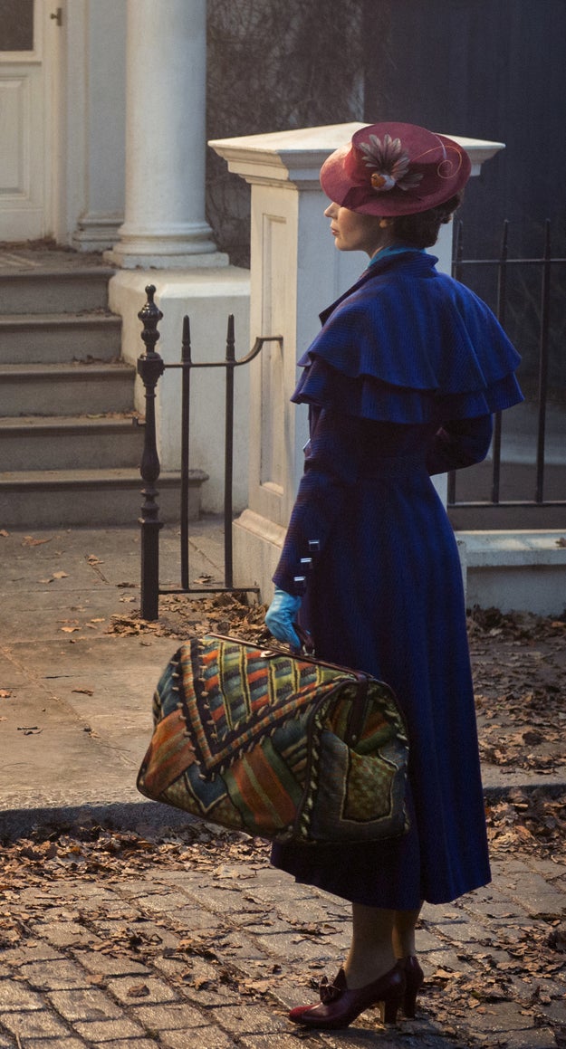 Basically, I cannot bear to give you any more context because we got our first look at Blunt in her Poppins costume today and LOOK AT IT: