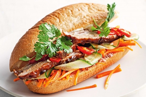 After Pho, Banh Mi is the next food item people know about when someone mentions Vietnamese cuisine. The traditional Banh mi is made with toasted baguette spread with liver pate, pickled radish and carrots, cilantro, sliced cucumbers, pork roll/ham, barbecued pork, and optional jalapenos. The best specialty spot for Banh Mi, is Jojus in Queens, New York.