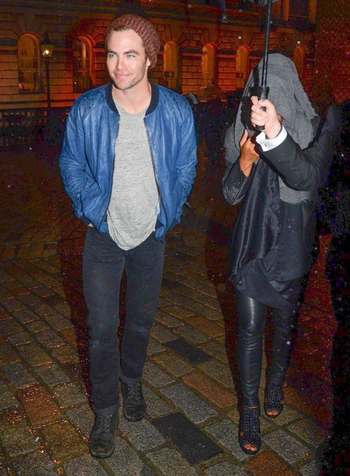 Level of rain: ☔ ☔ ☔ ☔ ☔ ☔ ☔How bothered by the rain? Chris is happy as a clam — but the girl next to him, not so much.