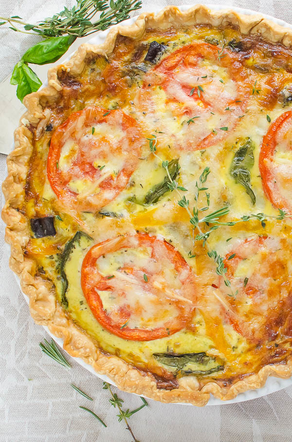 Ratatouille Quiche is loaded with spring veg and can be made the day before and reheated when you're ready to eat - and don't those colors scream spring?!!