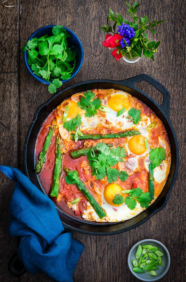 Let's start with an eye-popping egg dish. This gorgeous Asparagus Shakshuka takes 5 minutes to make and 40 minutes to bake! Winner!