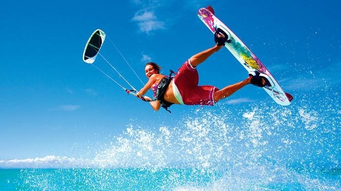 Getting bored with traditional surfing? Try Kitesurfing. With a boost from the kite soaring above you, you’ll be ripping through the water in no time